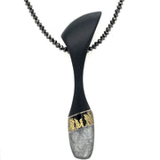 Steve Walters Pendant crafted with Meteorite, Black Onyx, and Gold Leaf with Mother of Pearl backing