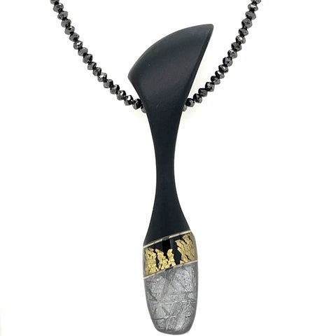 Steve Walters Pendant crafted with Meteorite, Black Onyx, and Gold Leaf with Mother of Pearl backing