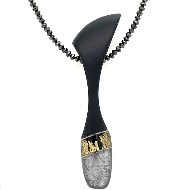Steve Walters Pendant crafted with Meteorite, Black Onyx, and Gold Leaf with Mother of Pearl backing