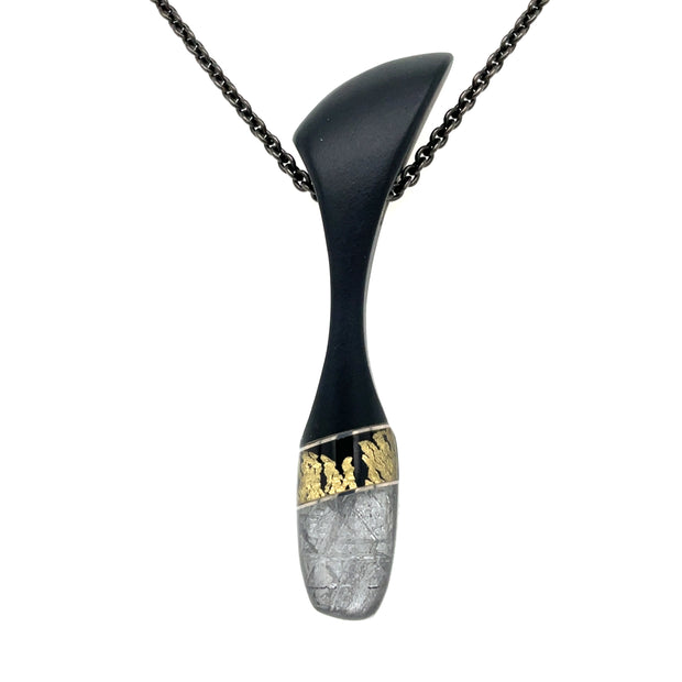 Steve Walters Pendant crafted with Meteorite, Black Onyx, and Gold Leaf with Mother of Pearl backing