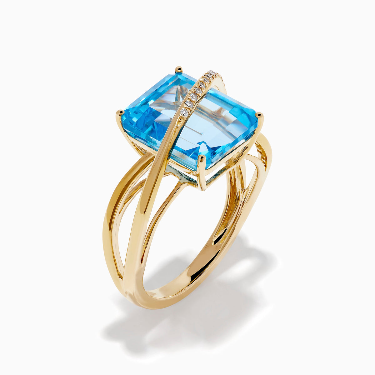 Blue Topaz and Diamond Crossover Ring in 14K Yellow Gold view 4