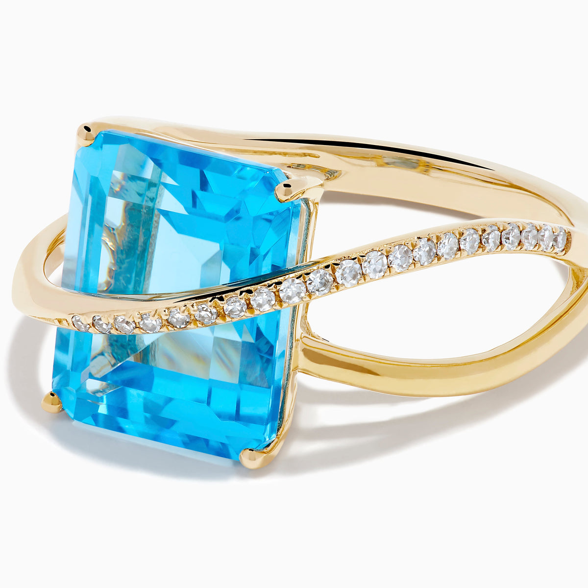 Blue Topaz and Diamond Crossover Ring in 14K Yellow Gold view 2