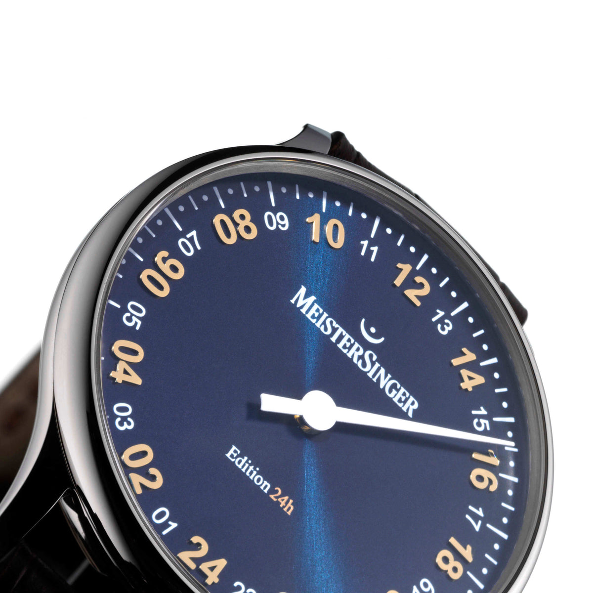 MeisterSinger 24H Edition dial close-up showing the gold 24-hour numerals and single hand
