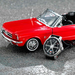 MeisterSinger Edition Route 66 watch beside the included 1:18-scale red Ford Mustang Convertible model, angle view