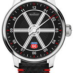 MeisterSinger Edition Route 66 single-hand watch with black Mustang-wheel dial and black leather strap with red accents, front view