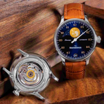 MeisterSinger Lunascope front and case back on a wood surface