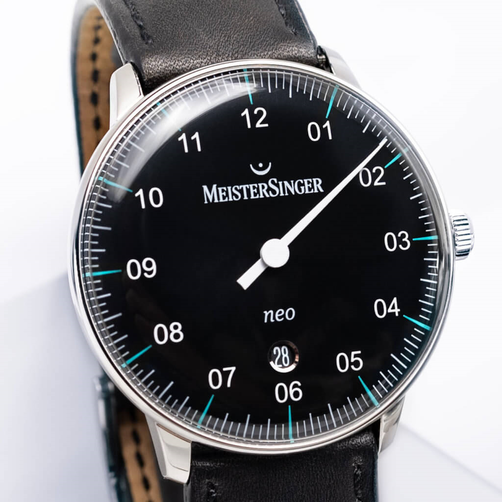 MeisterSinger Neo Plus black dial close-up with azure blue accents