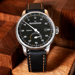 MeisterSinger Primatic on a wooden stand