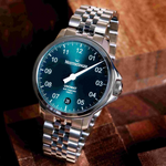 MeisterSinger Unomat on a wooden surface, angled view