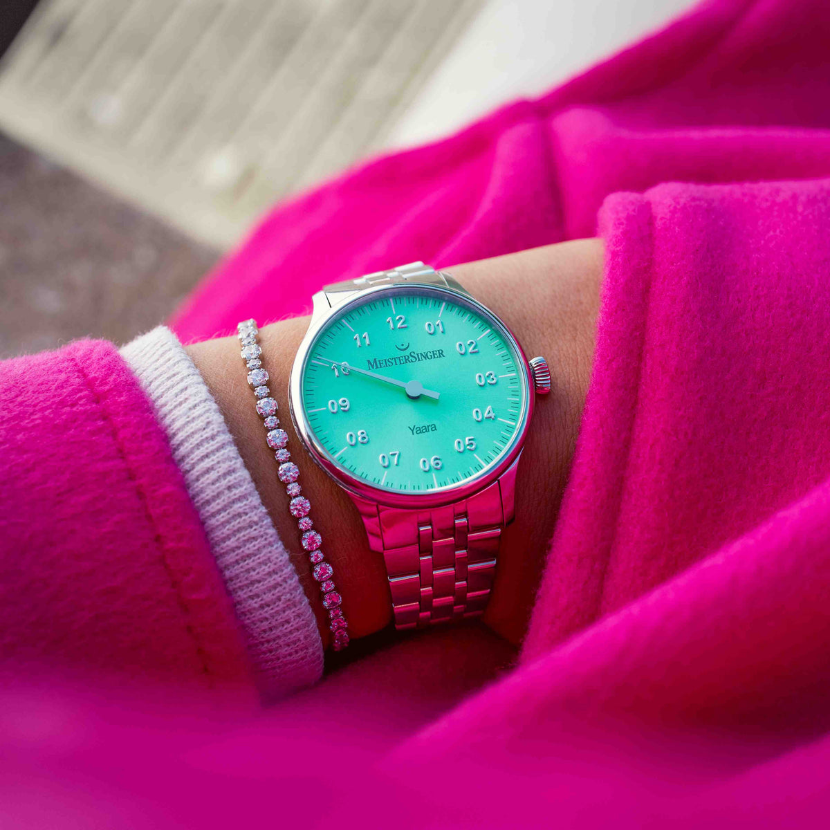 MeisterSinger Yaara women's watch with mint dial and stainless steel bracelet, on the wrist