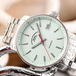 Mühle-Glashütte 29er with mint dial and stainless steel bracelet, close-up lifestyle view