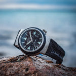 Mühle-Glashütte S.A.R. Rescue-Timer dive watch with black dial and black rubber strap, lifestyle view