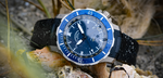 Seebatallion GMT resting on a rocky, outdoor surface