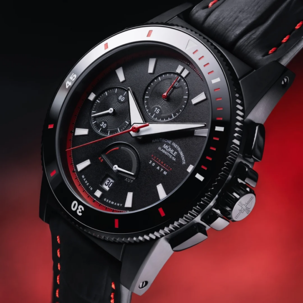 Close-up of the Sportivo Power Chronograph black dial with red chronograph details