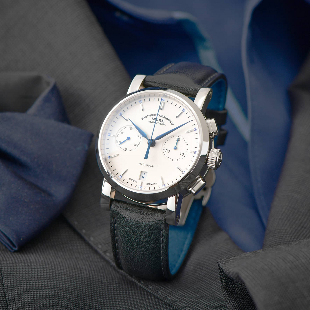 Teutonia IV Chronograph on a gray suit jacket