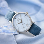 Mühle-Glashütte Teutonia IV Lady women's watch with pastel blue dial and blue velour leather strap, angle view