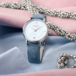 Mühle-Glashütte Teutonia IV Lady women's watch with pastel blue dial and blue velour leather strap, lifestyle view