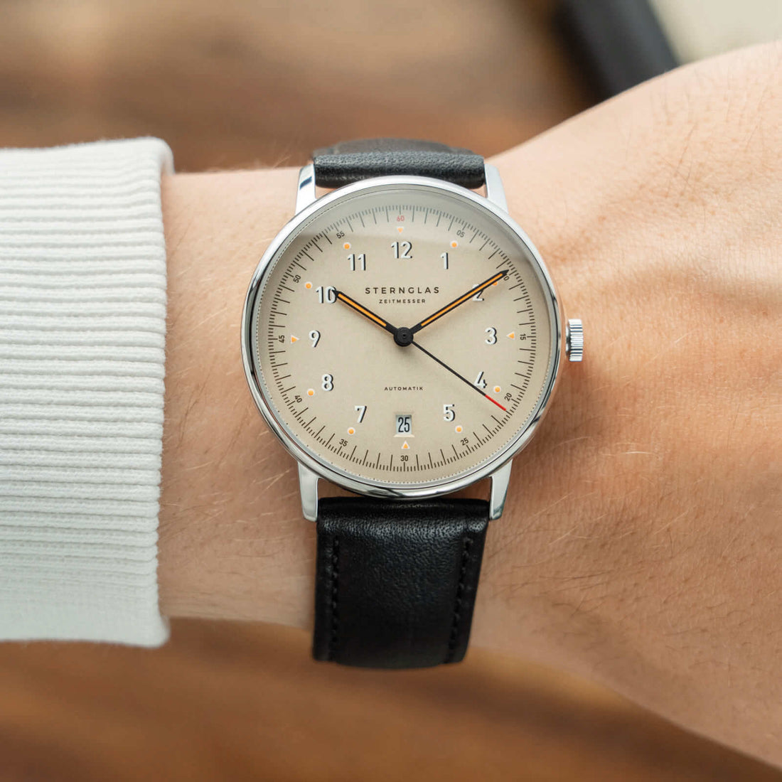 Sternglas Lumatik beige worn on the wrist