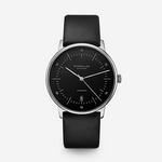 Sternglas Naos Automatic with black dial and black leather strap, front view